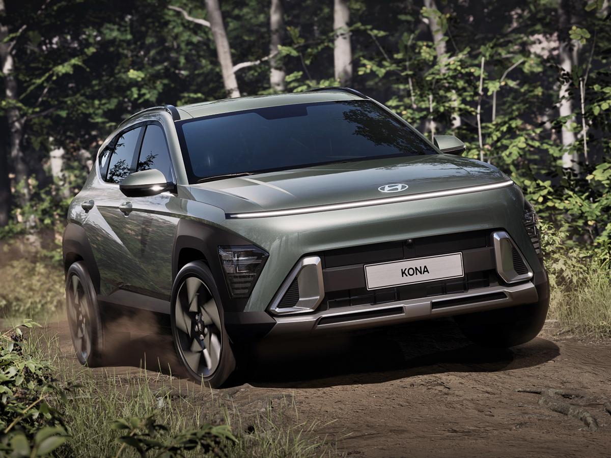 2023 Hyundai Kona driving on a dirt road.