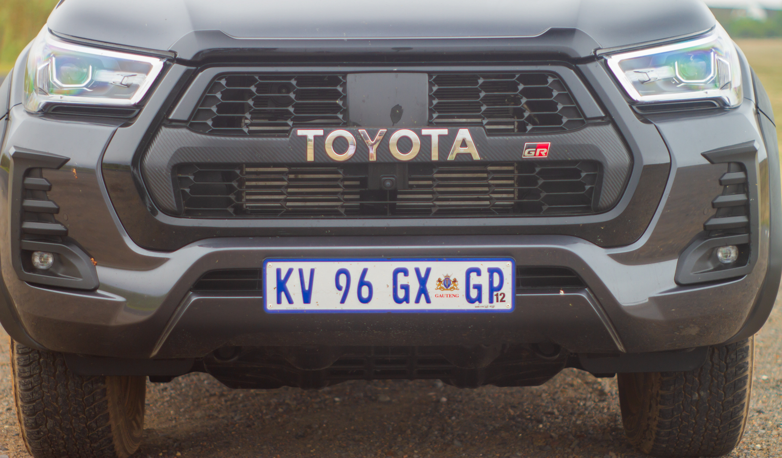 Toyota Hilux GR-S blacked-out front grille.