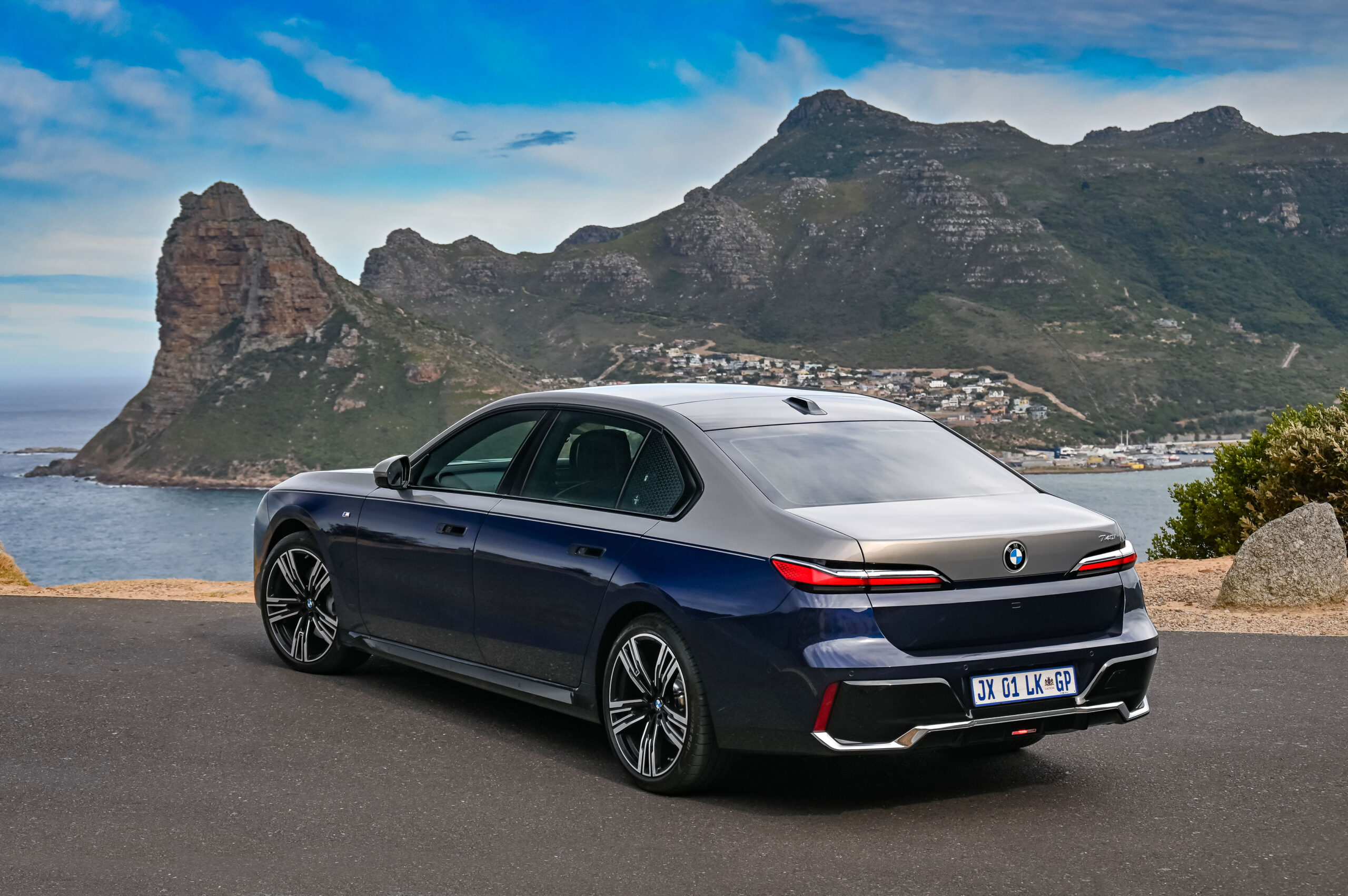 BMW 7 Series (G70) i7. Rear-three quarter view.