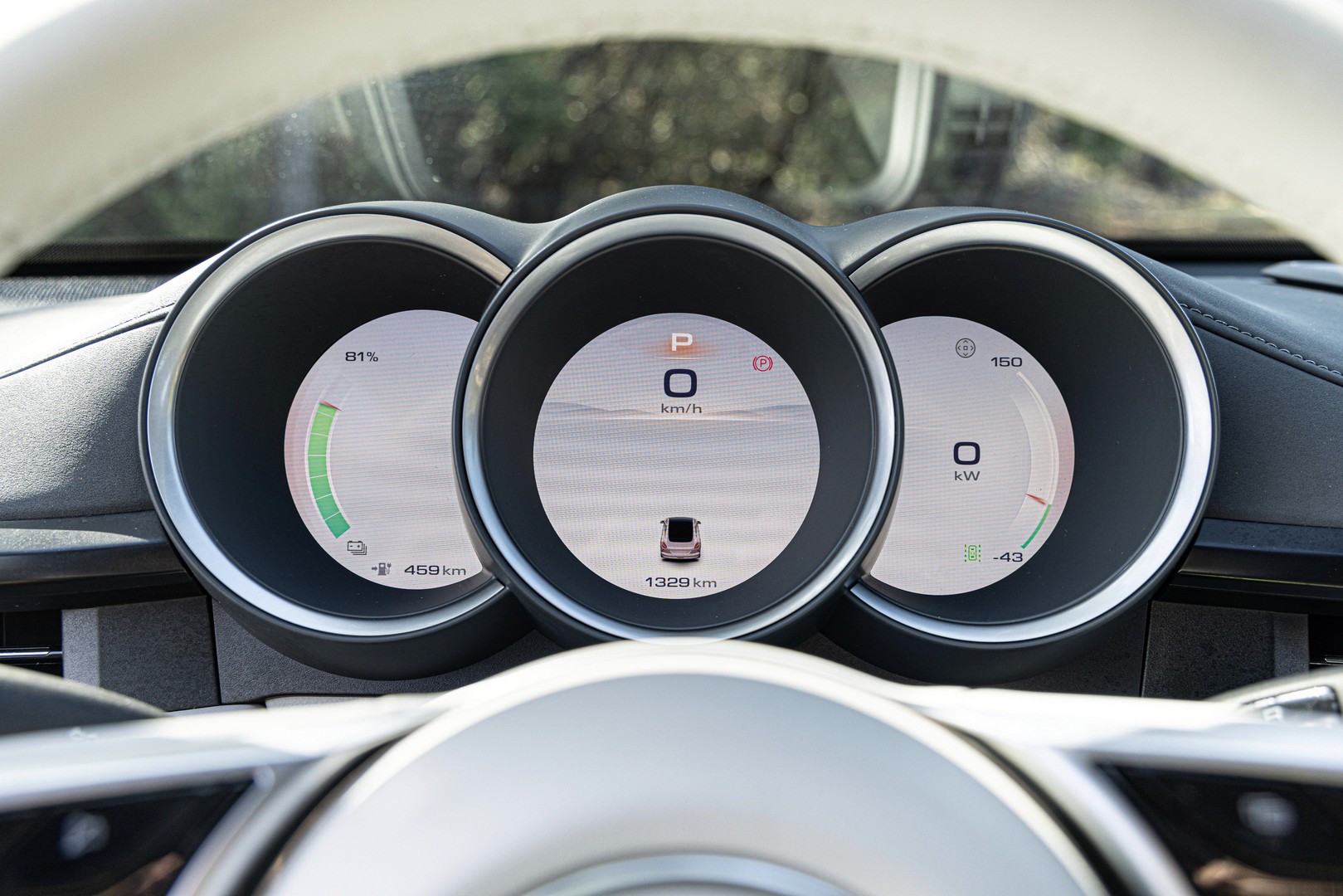 The tri-tubular design of the GWM Ora Sport's digital instrument cluster.