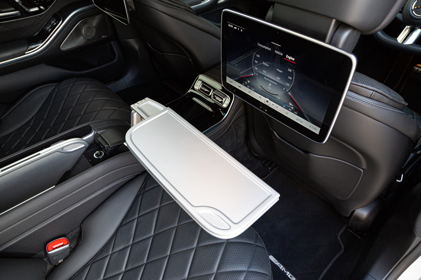 The W223 Mercedes-Benz S-Class offers aircraft-style fold-out tables.
