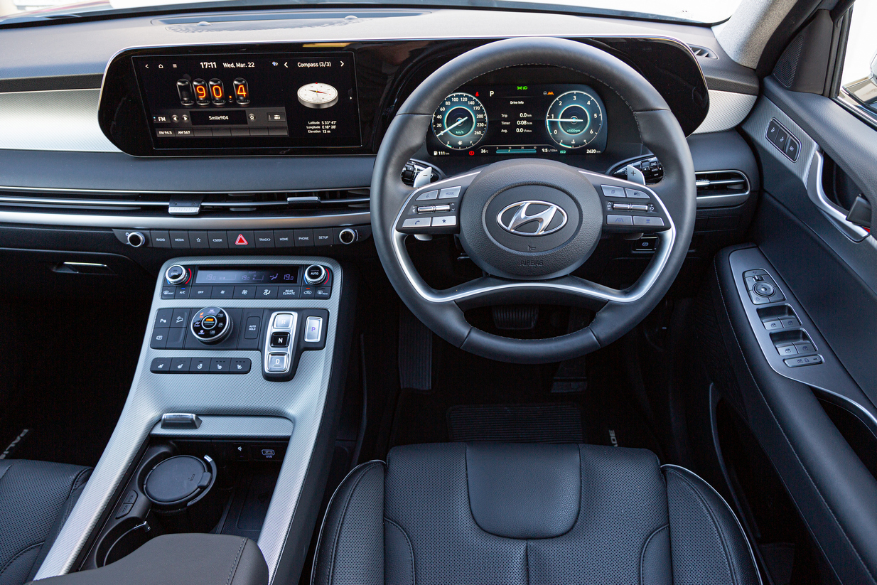 2023 Hyundai Palisade front of cabin with leather trim and metallic inserts.