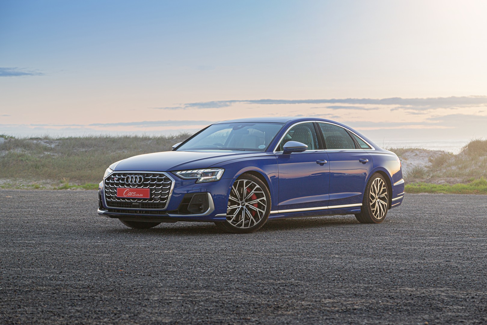 2023 Audi S8 front three-quarter view.