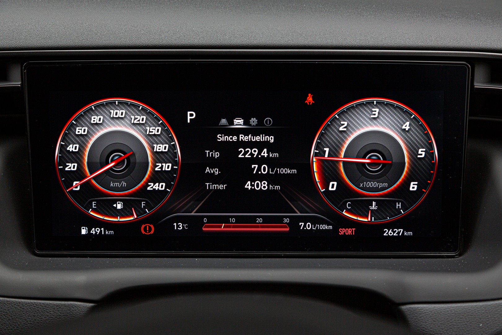 Hyundai Tucson N Line has a digital instrument cluster that displays red accents when Sport mode is engaged.