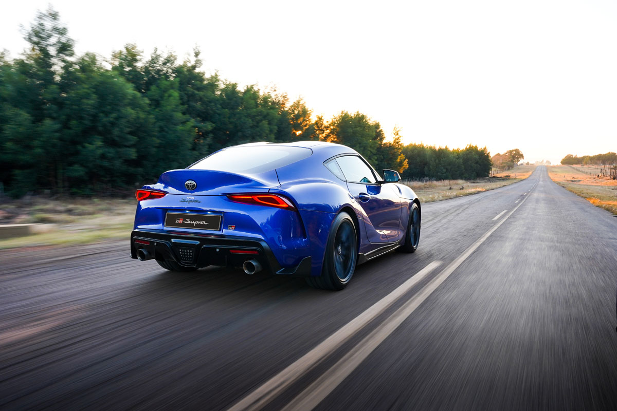 2023 GR Supra rear three-quarter view.