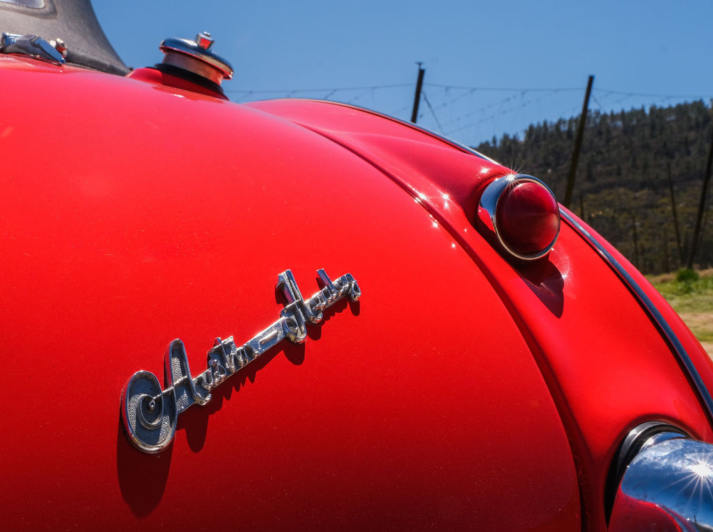 Austin-Healey cursive nameplate