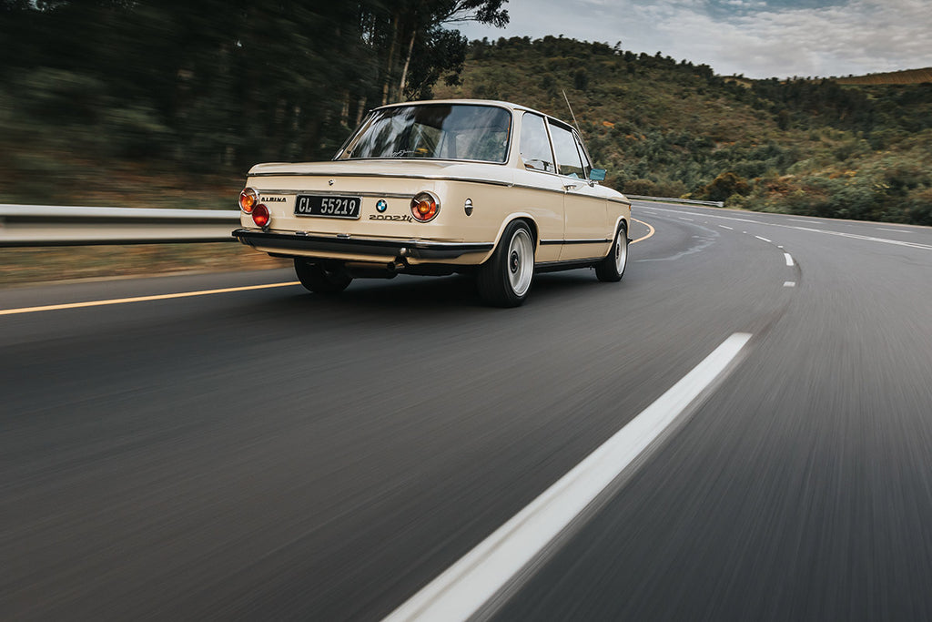BMW 2002tii rear tracking shot