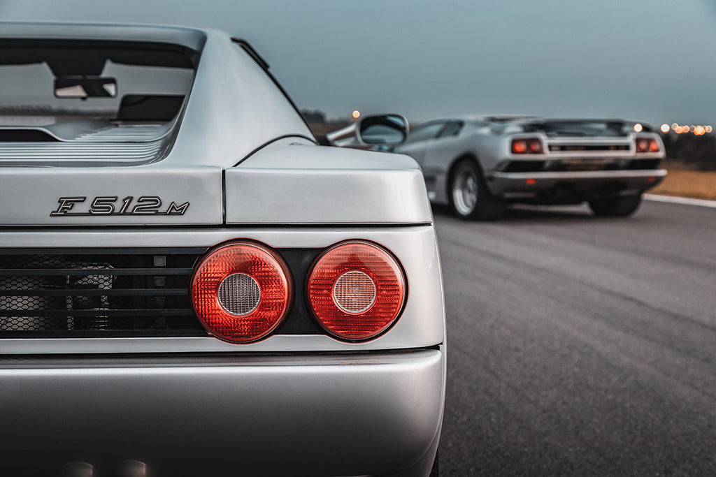 Ferrari F512 M (left) and Lamborghini Diablo rear view