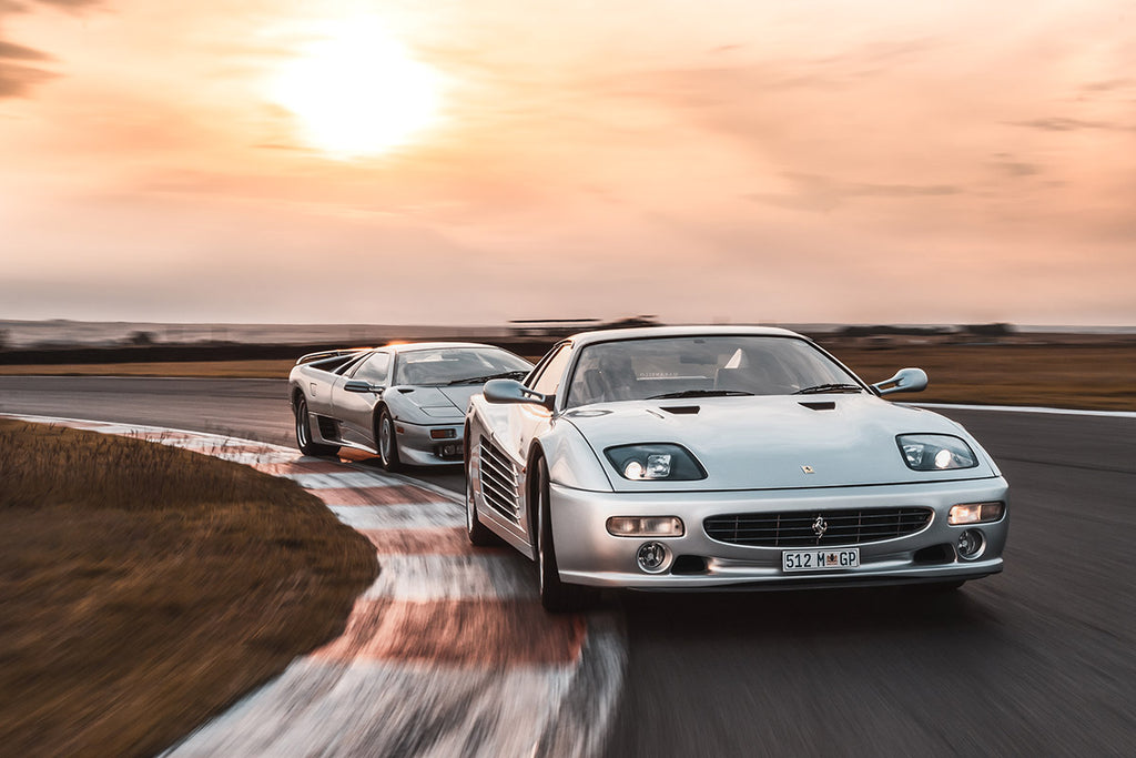 Ferrari F512 M (right) followed by a Lamborghini Diablo at Red Star Raceway.