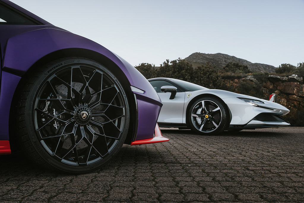 Lamborghini Huracan STO (left) and Ferrari SF90 Spider