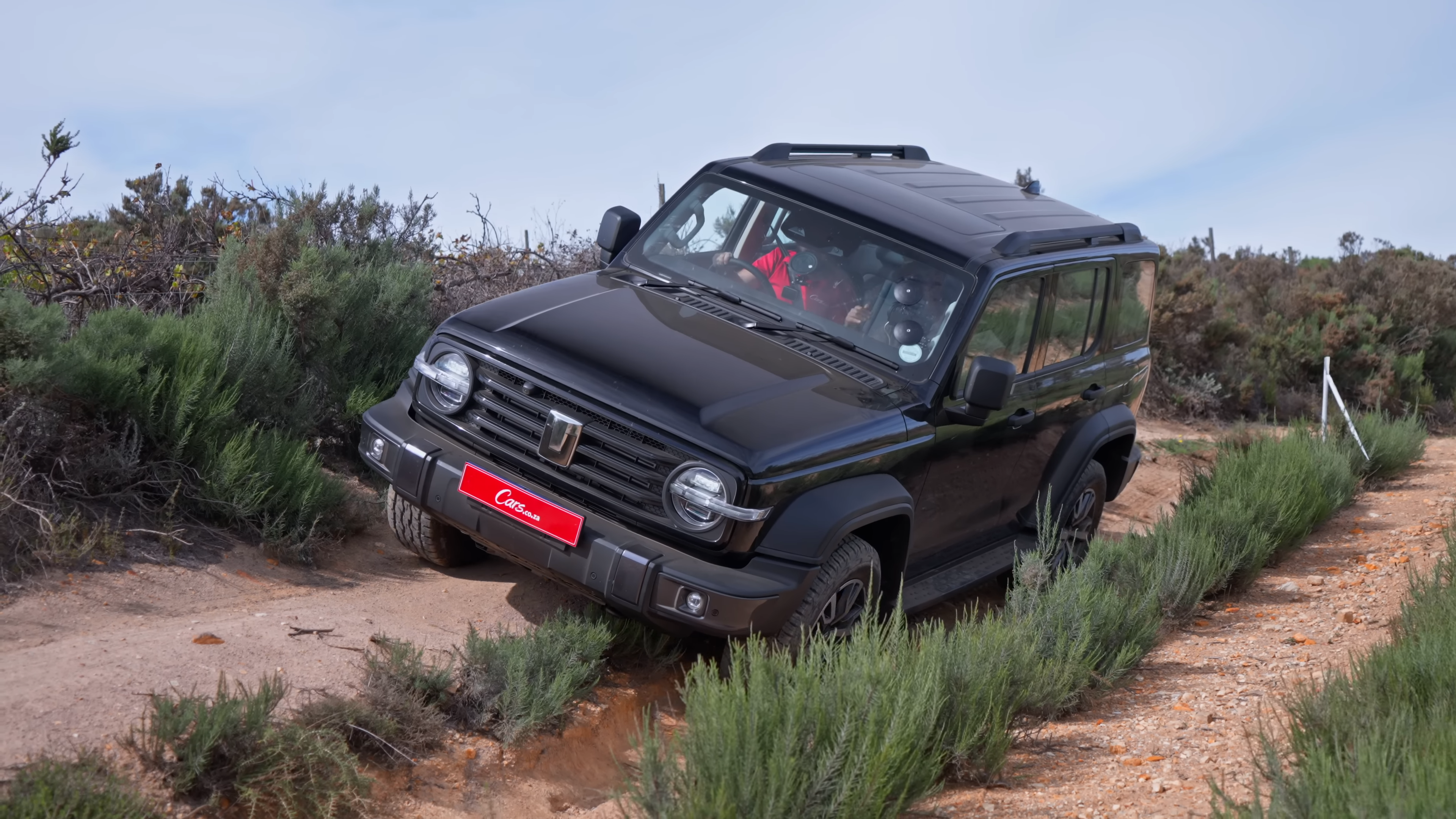 GWM Tank 300 Diesel on a banked off-road section