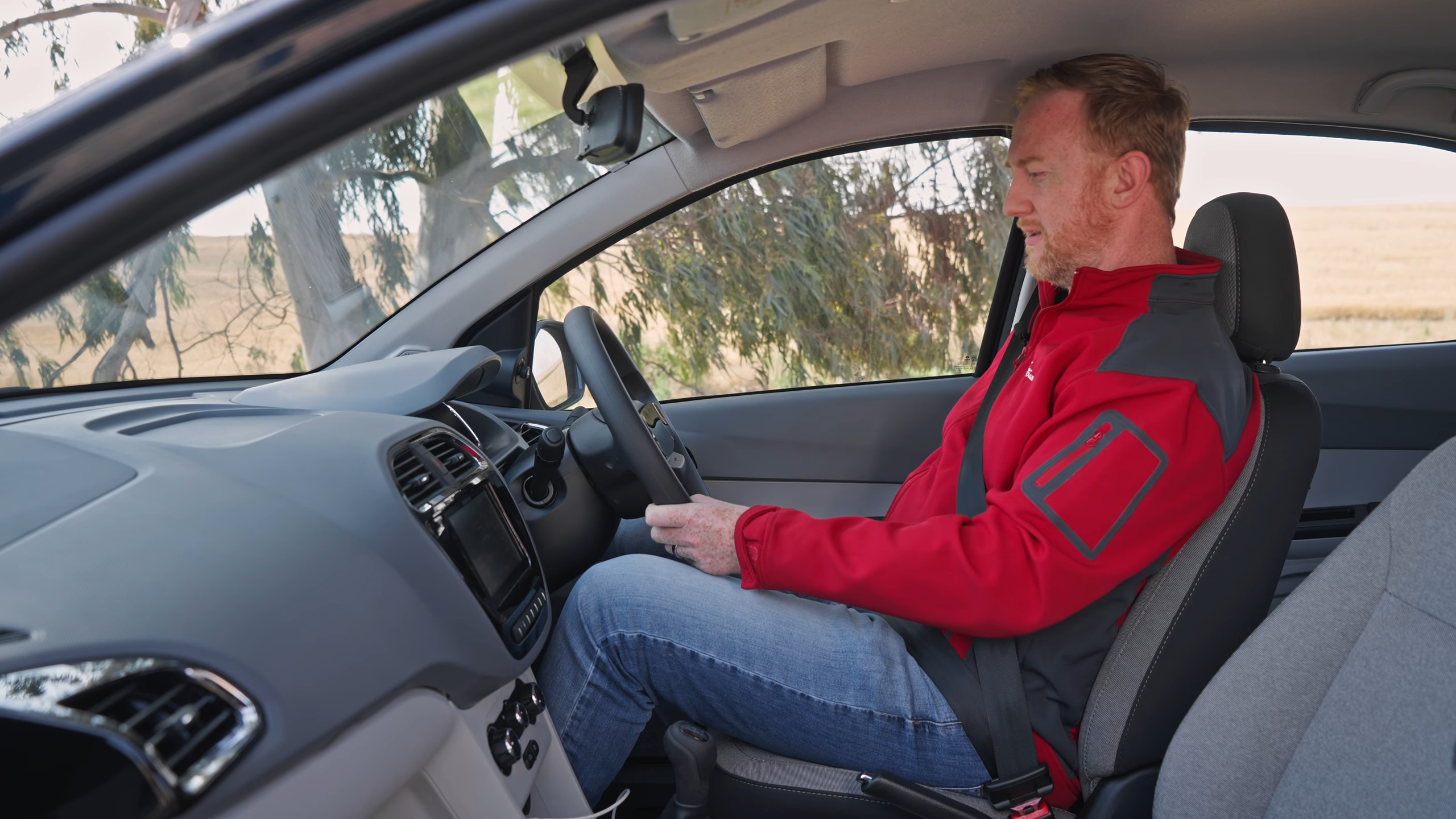 David Taylor tests the height adjustability of the driver's seat in the Tata Tiago